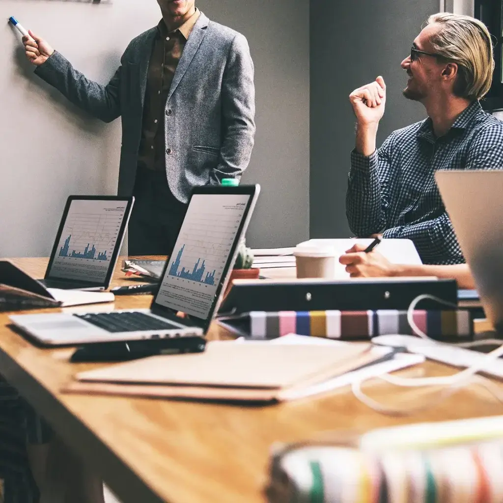 About Us – Professional team meeting and business strategy discussion showcasing collaboration, innovation, and project planning at GreenTech Solution.