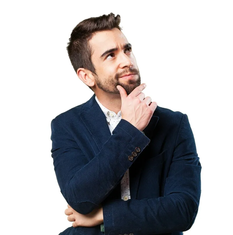A thoughtful man in a blue blazer looking upward with a reflective expression, representing decision-making and confidence — illustrating “The Green Tech Difference: Why We’re the Clear Choice” by GreenTech Solution.