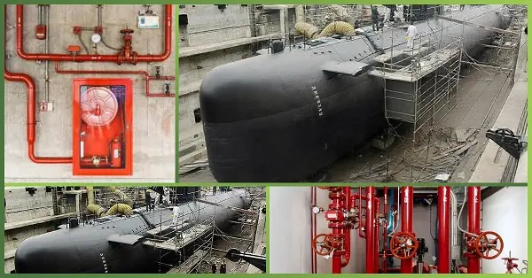 Technicians inspecting and maintaining a Fire Hydrant System at Navy Dockyard with visible red hydrant valves, piping network, and safety equipment installed for emergency fire protection – GreenTech Solutions.