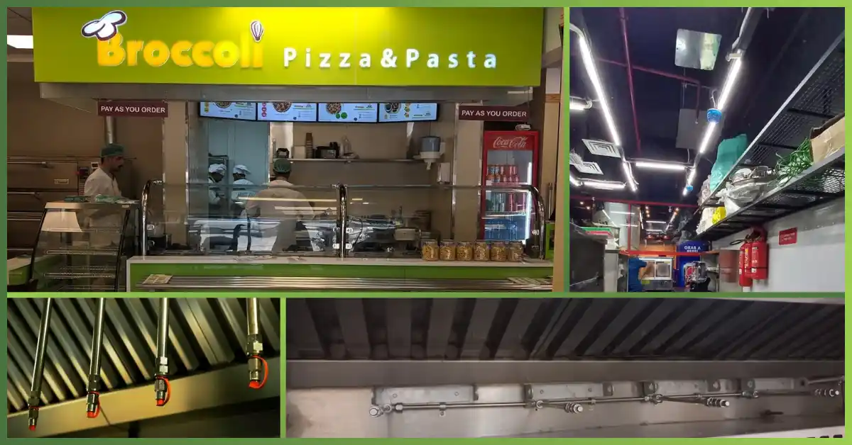Kitchen hood fire suppression system installed at Broccoli Pizza & Pasta, showcasing nozzles, piping, and commercial kitchen safety setup — Kitchen Hood Fire Suppression System at Broccoli by GreenTech Solution